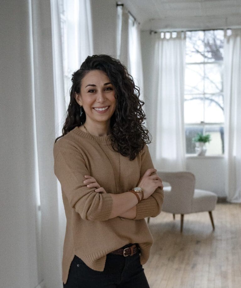 Sarah Steinbrecher standing in her office at Thera-fi.